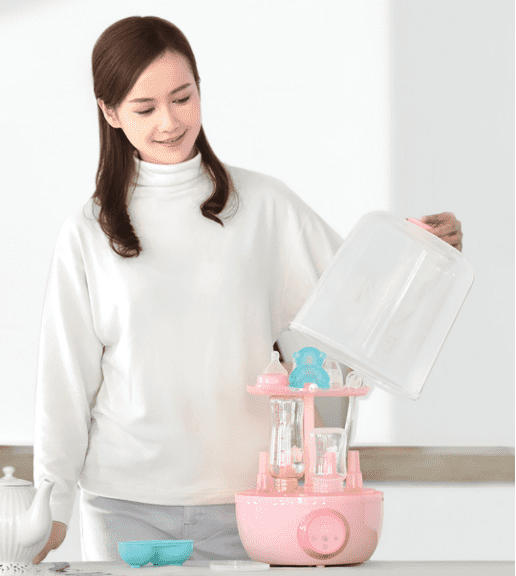 Стерилизатор для бутылочек в розовом цвете